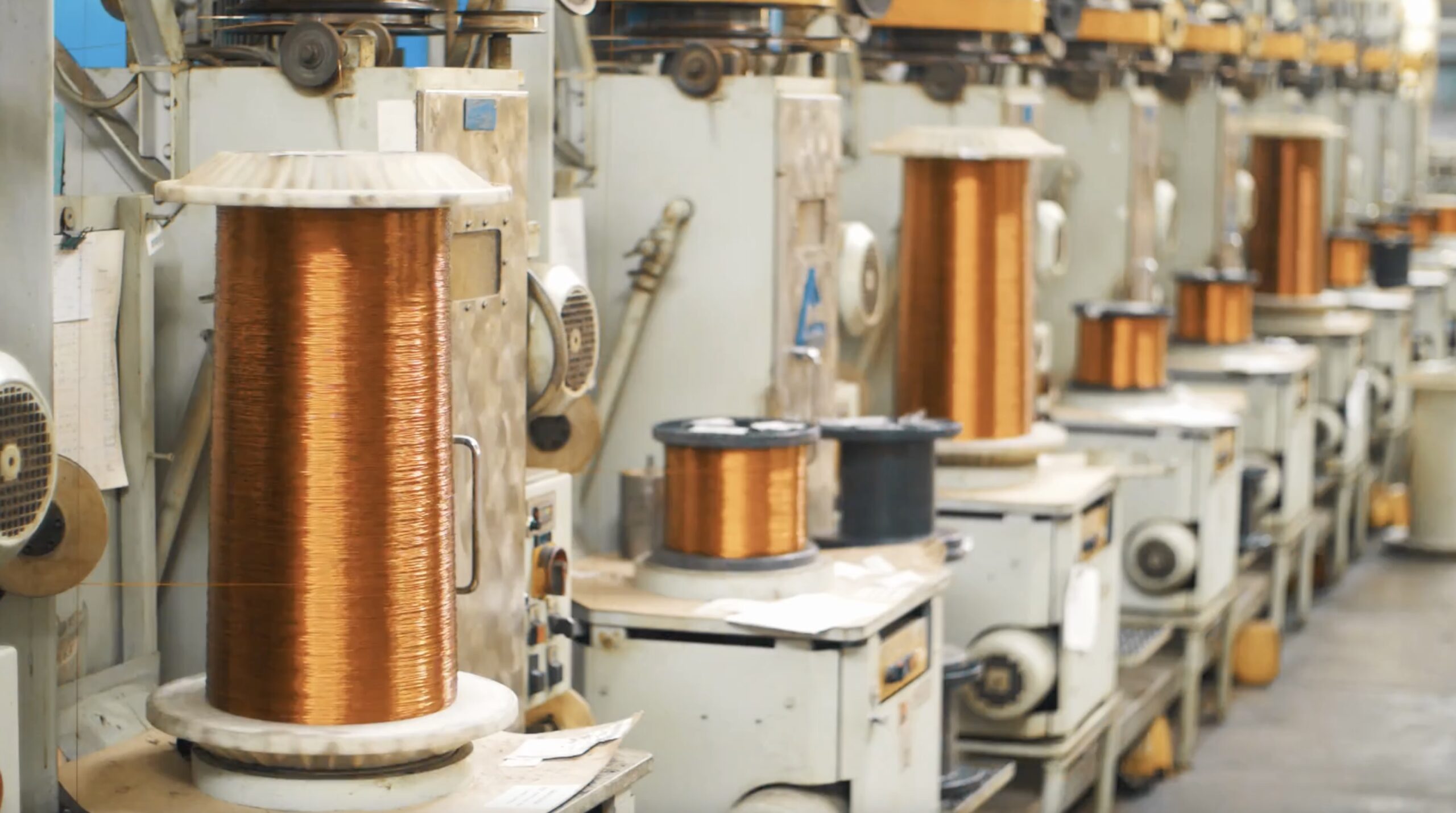 Copper Wire Winding On Coils On Industrial Machines At Factory For Electric Motors